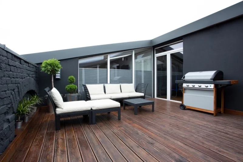 Barbecue area on a patio with timber decking