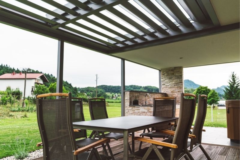 outdoor living area with pergolas