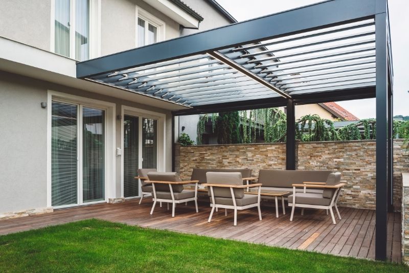 cozy patio living area extension with pergolas