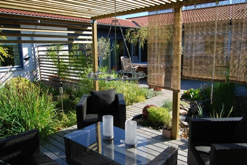 cozy outdoor living space with pergolas