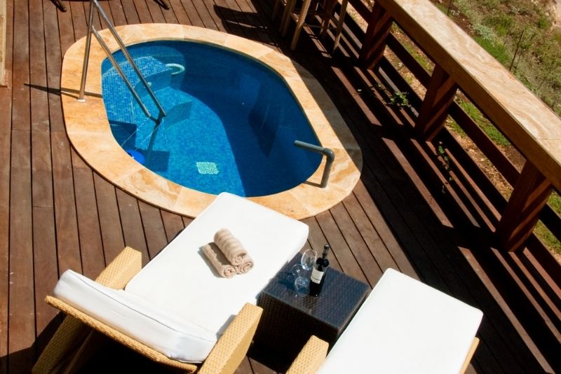 residential in ground pool with timber decking